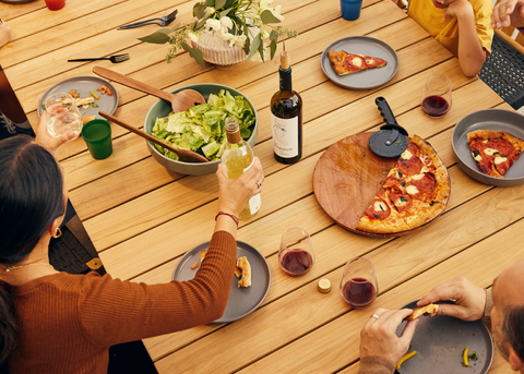 Neighbor teak outdoor dining table with food