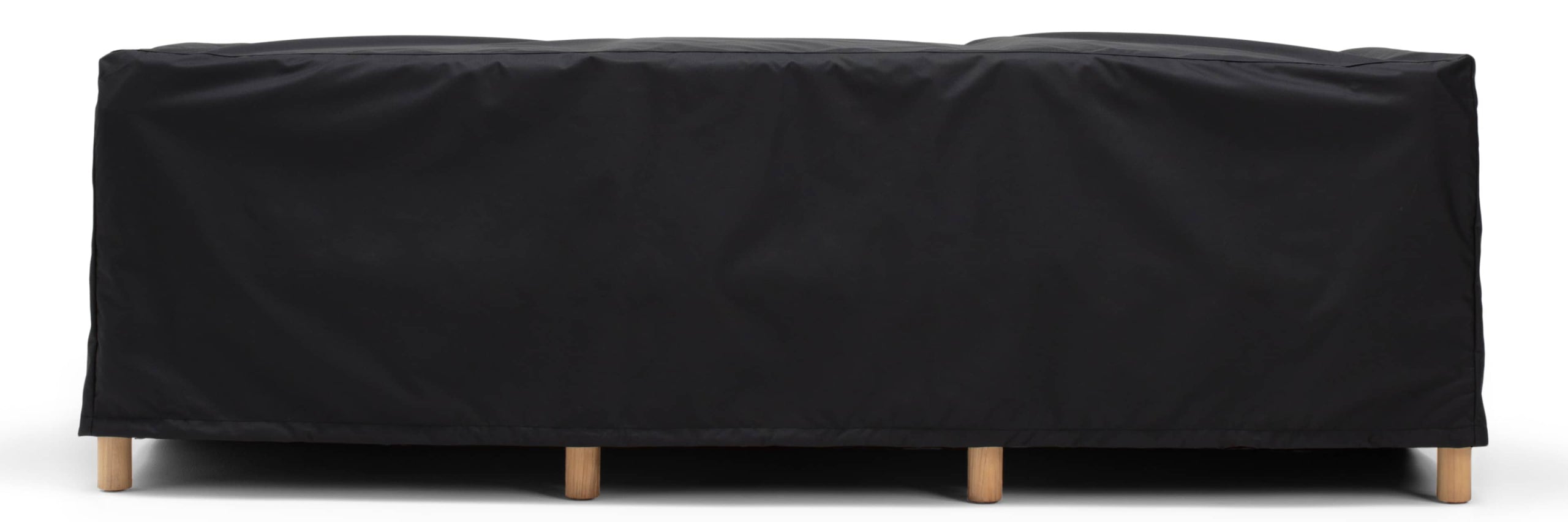 Outdoor sofa covered by a black protective cover