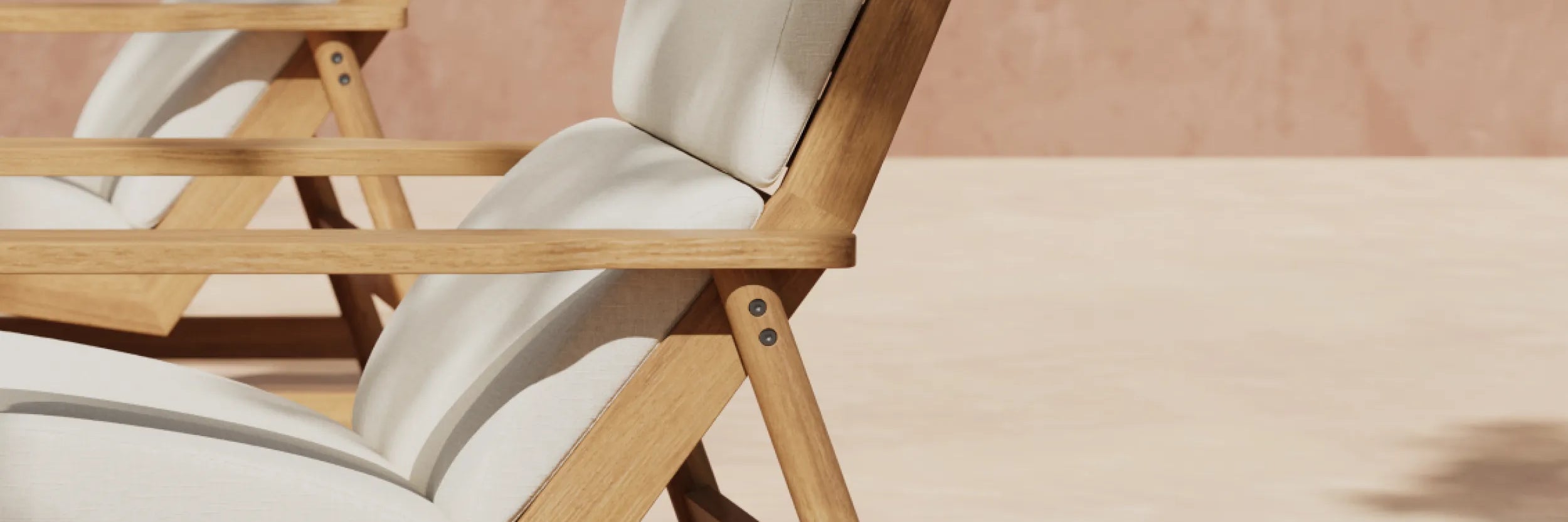 Two teak deck chairs with white cushions