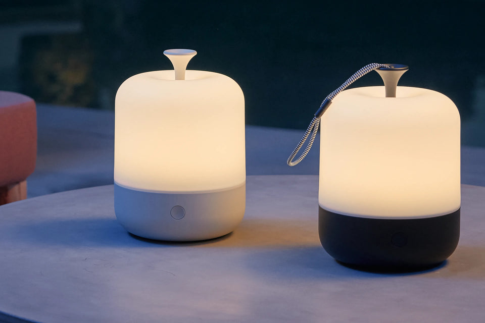 Closeup of Neighbor Acorn Lanterns in putty and charcoal in outdoor evening setting