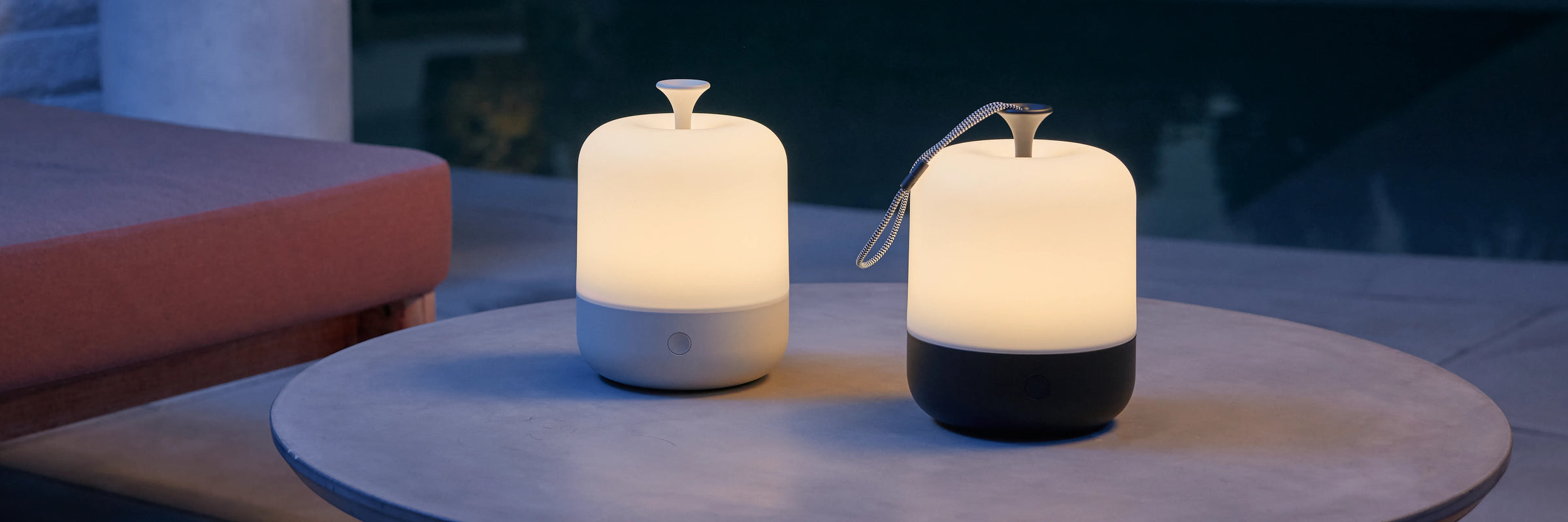 Closeup of Neighbor Acorn Lanterns in putty and charcoal in outdoor evening setting