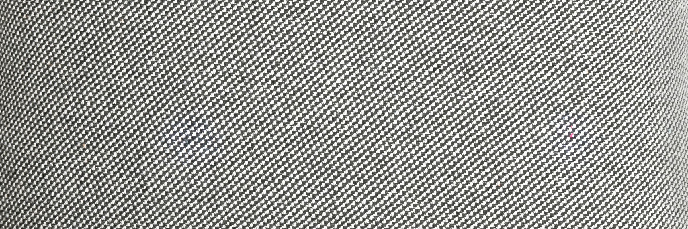 Closeup of Neighbor Crosshatch Throw Pillow woven grid texture in outdoor setting