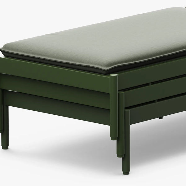 Sun lounger frame and cushion detail — angled view of Terra Sun Lounger end section in forest green aluminum with sage cushion on white background
