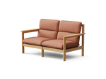 Felloe Loveseat, with arms, in Heritage Rust, three-quarter view