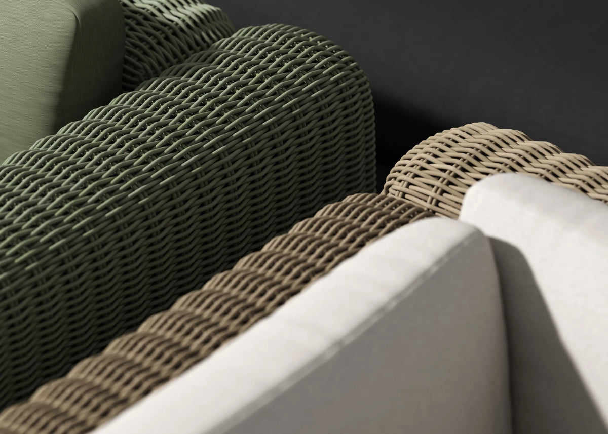 Close-up of three wicker chair arms in sage green, natural, and charcoal, showing contrasting material textures