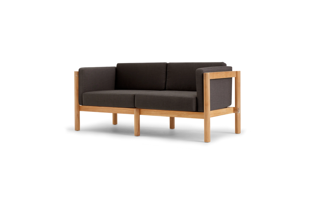 Haven Loveseat, with cushion arms, in Coal, three-quarter view