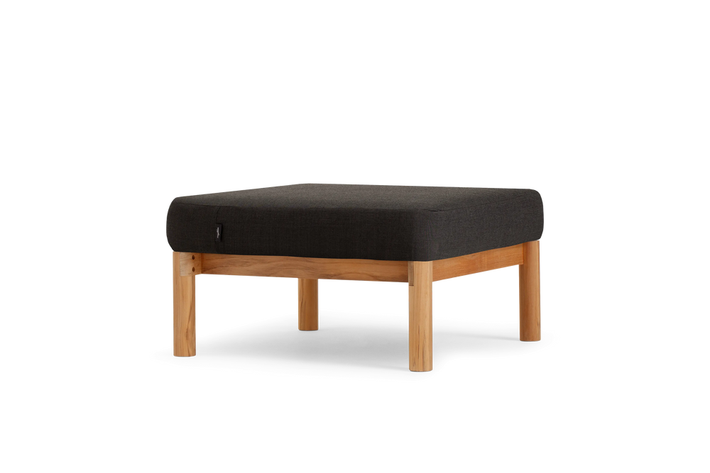 Haven Ottoman, in Coal, three-quarter view