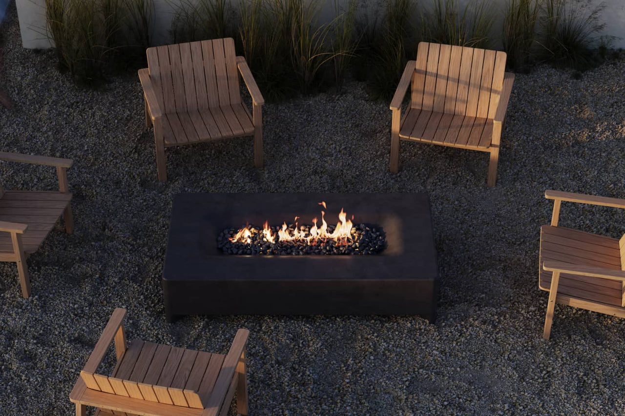 Neighbor rectangular fire pit table in a backyard surrounded by teak Adirondack chairs
